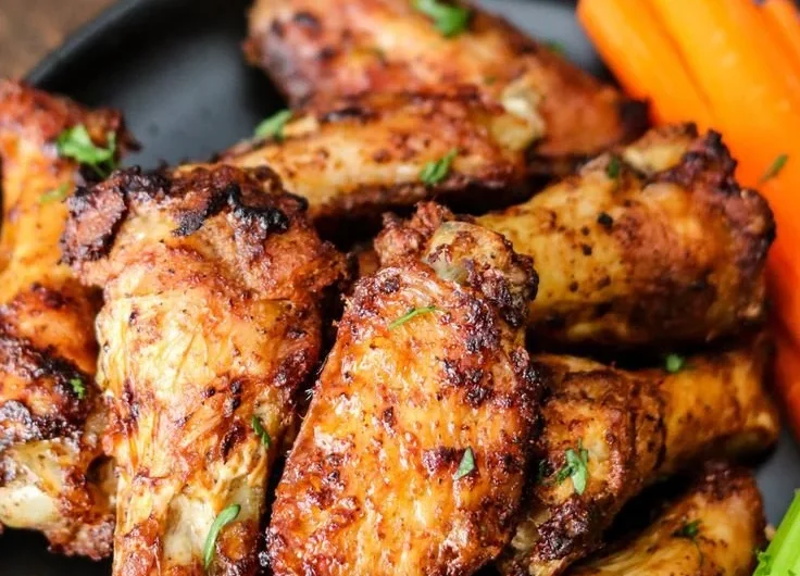 Crispy air fryer chicken wings served with dipping sauce