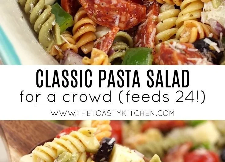A bowl of classic pasta salad with colorful vegetables and dressing