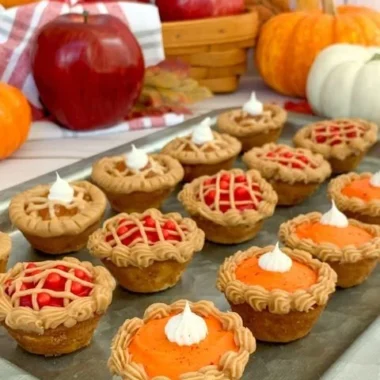 Assorted Cutie Pie Mini Cakes served on a decorative plate for a festive occasion.