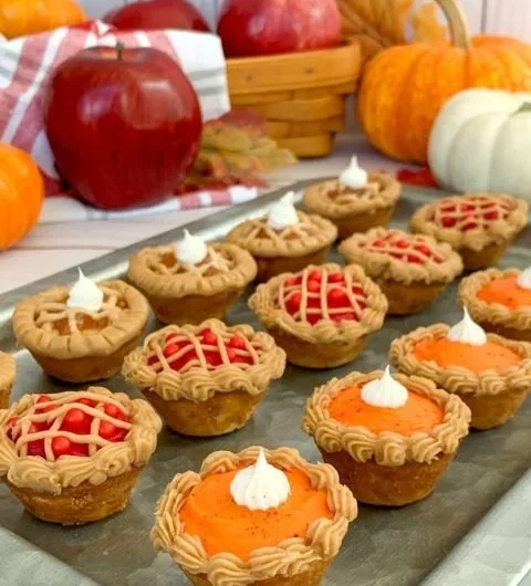 Assorted Cutie Pie Mini Cakes served on a decorative plate for a festive occasion.