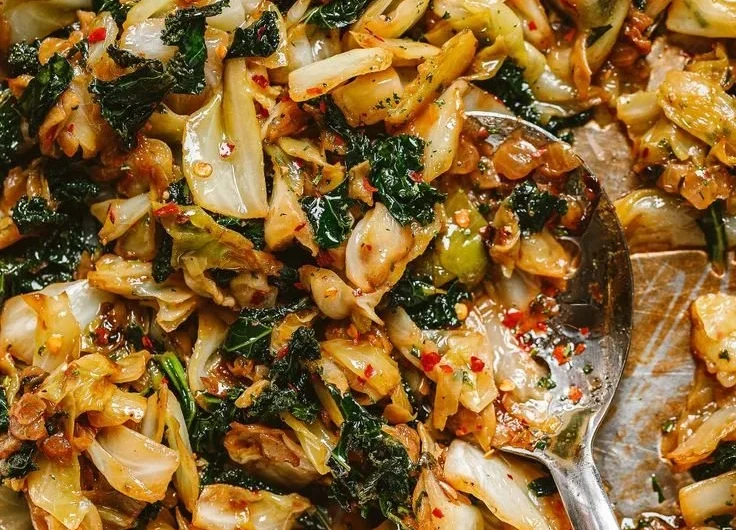 Garlic sautéed cabbage and kale skillet in a frying pan