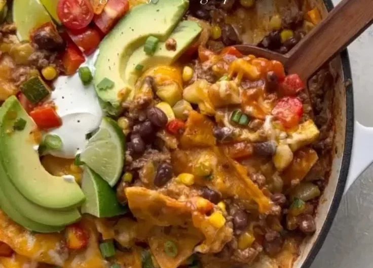 One Pan Enchilada Casserole baked with layers of tortillas, cheese, and spices