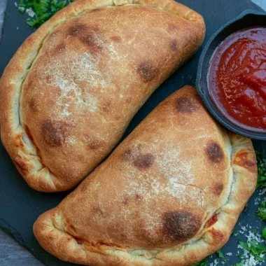 Delicious homemade Air Fryer Calzones with cheese and toppings