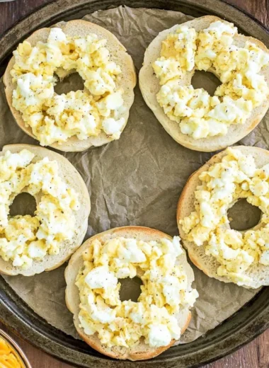 Delicious breakfast pizza bagels topped with fresh ingredients and melted cheese