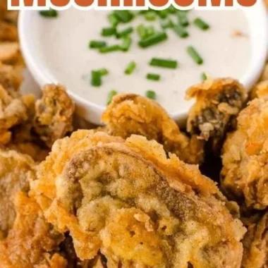 Plate of crispy fried mushrooms served with dipping sauce