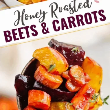 Plate of honey roasted beets and carrots garnished with herbs