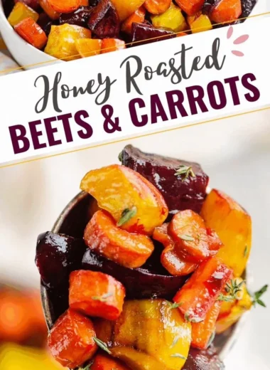 Plate of honey roasted beets and carrots garnished with herbs