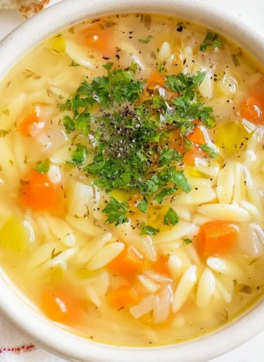 Delicious homemade orzo soup served in a bowl