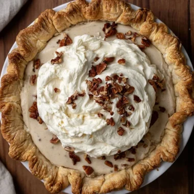 Delicious Pecan Cream Pie with a rich, creamy filling and topped with pecans