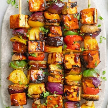 Colorful vegetarian kebabs with fresh vegetables and spices on skewers