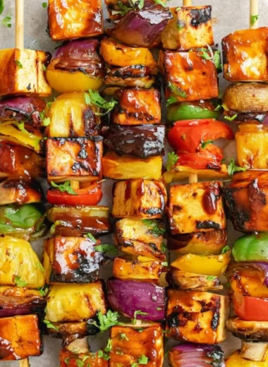 Colorful vegetarian kebabs with fresh vegetables and spices on skewers