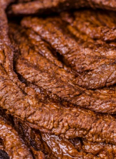Delicious cozy grilled beef steak served with sides on a rustic table