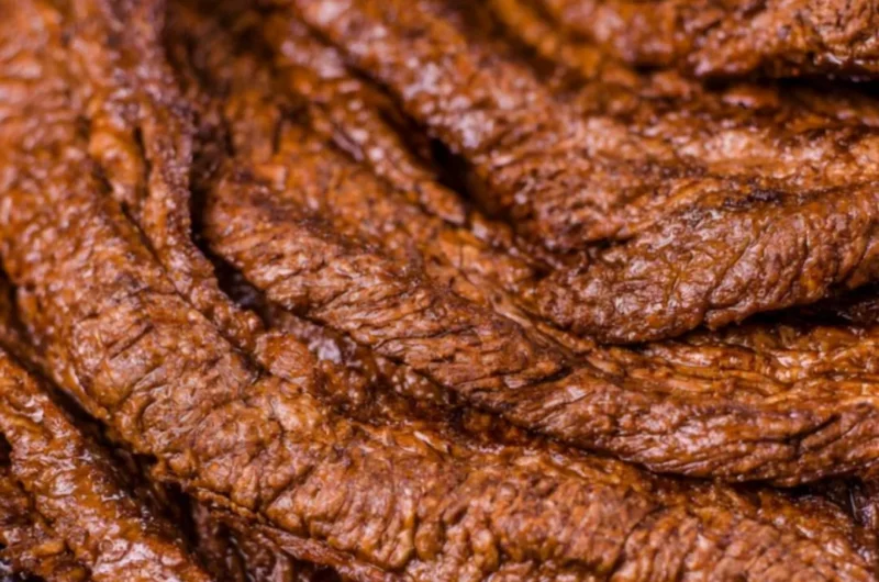 Delicious cozy grilled beef steak served with sides on a rustic table