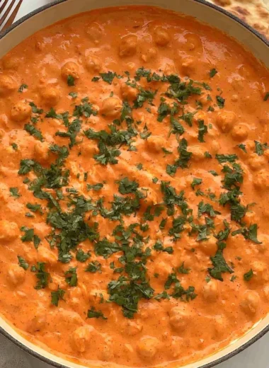 Cozy Indian Butter Chickpeas in a creamy tomato sauce served with rice