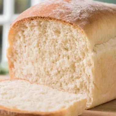 Homemade Farmhouse Sourdough Loaf with golden crust and soft interior