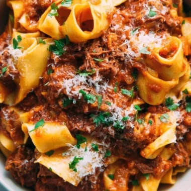 Delicious homemade short rib ragu served over pasta