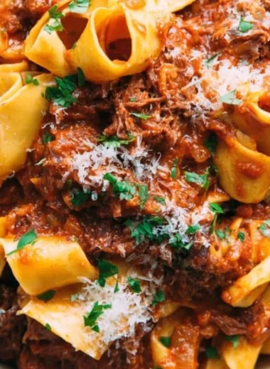 Delicious homemade short rib ragu served over pasta