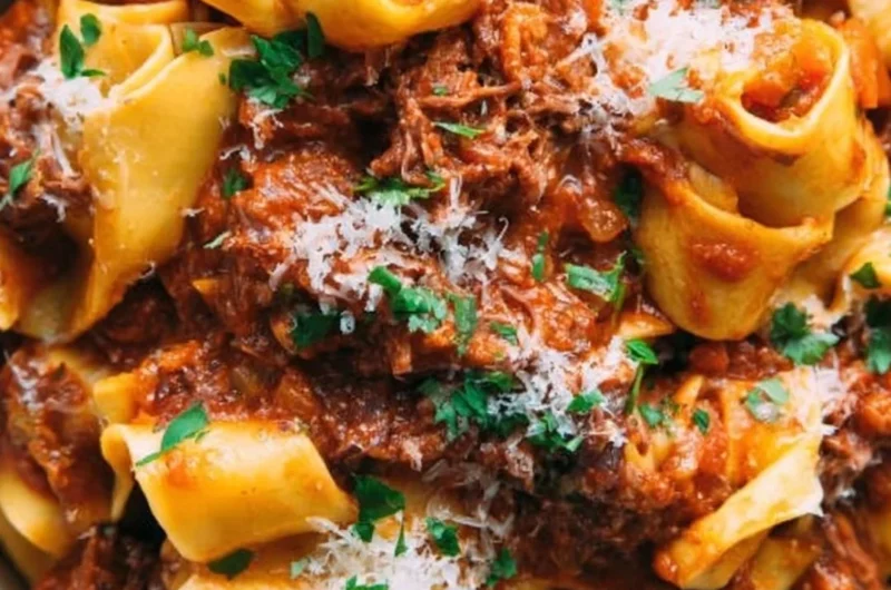 Delicious homemade short rib ragu served over pasta