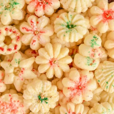 Cozy buttery spritz cookies on a decorative plate