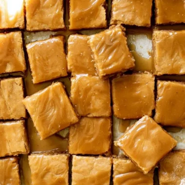 Cozy maple blondies with a delicious maple glaze drizzled on top.